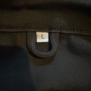 Black denim jacket with red embroidery